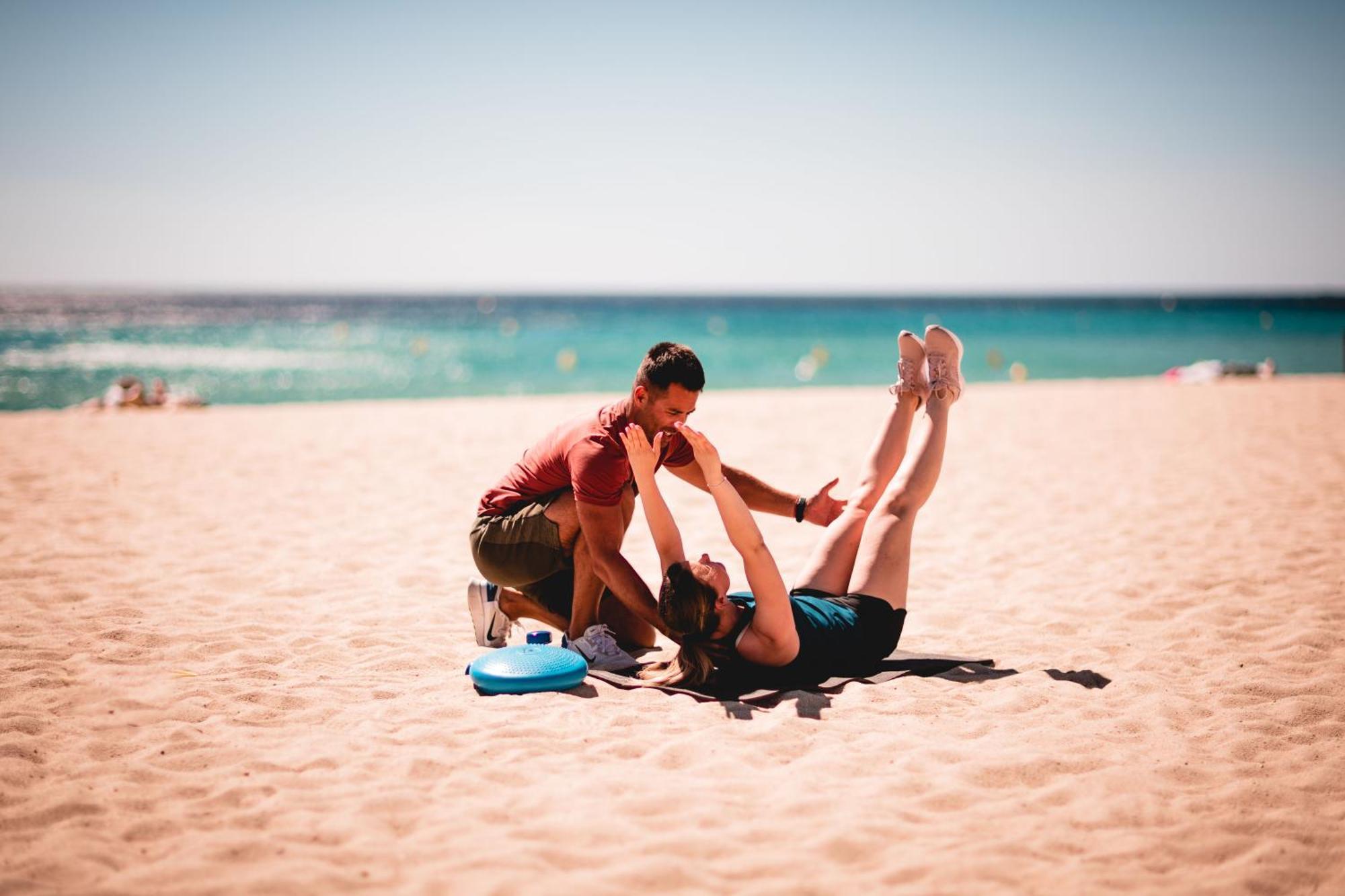 Toison D'Or Hotel Ramatuelle Ngoại thất bức ảnh A personal trainer working with a client on the beach